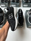 Zapatilla New Balance Black & White